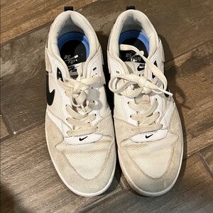 Nike Women’s White and Black Skate Sneakers